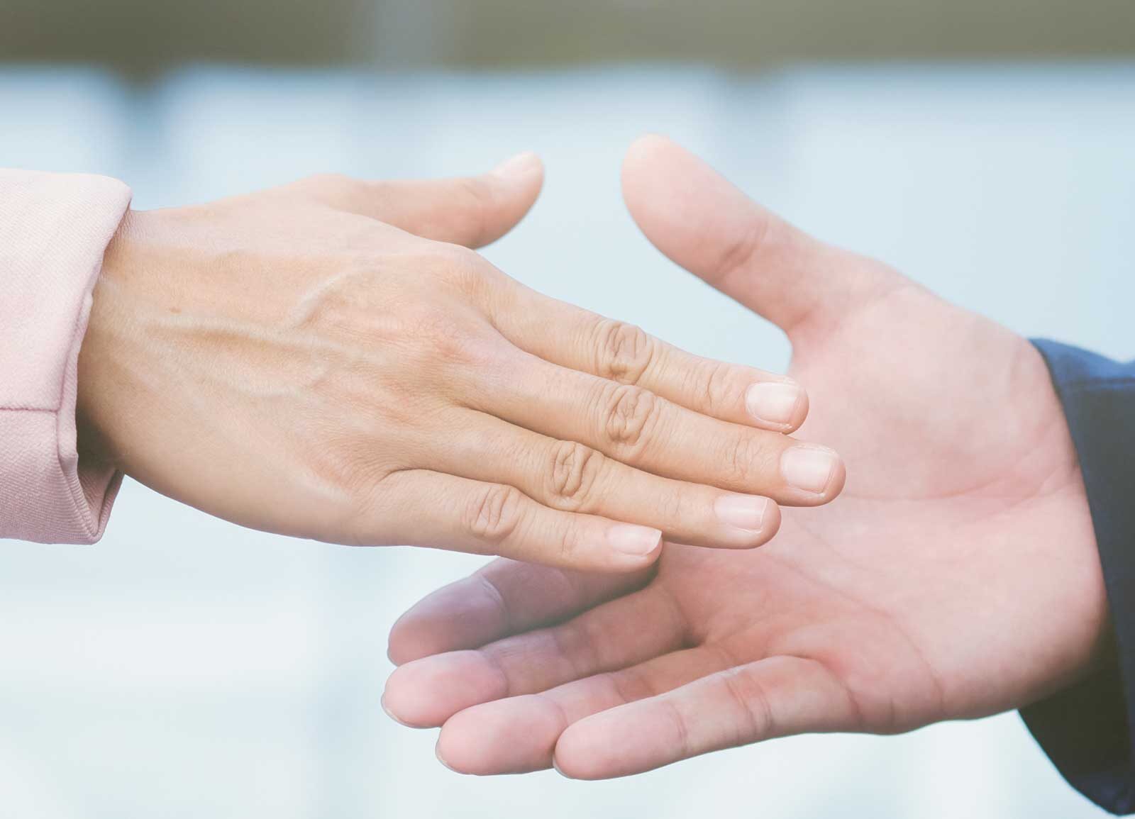 Handskakning. Foto: Envato Elements.