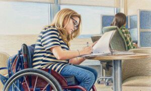 Tjej i rullstol arbetar.